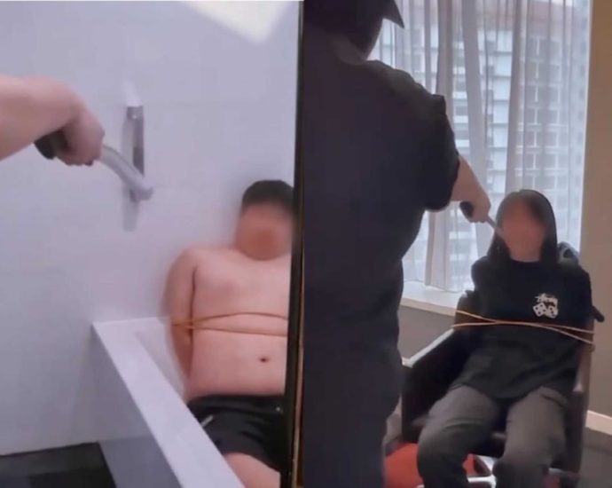 2 men arrested in China officials impersonation and staged kidnap scams; 2 victims lost nearly S0,000