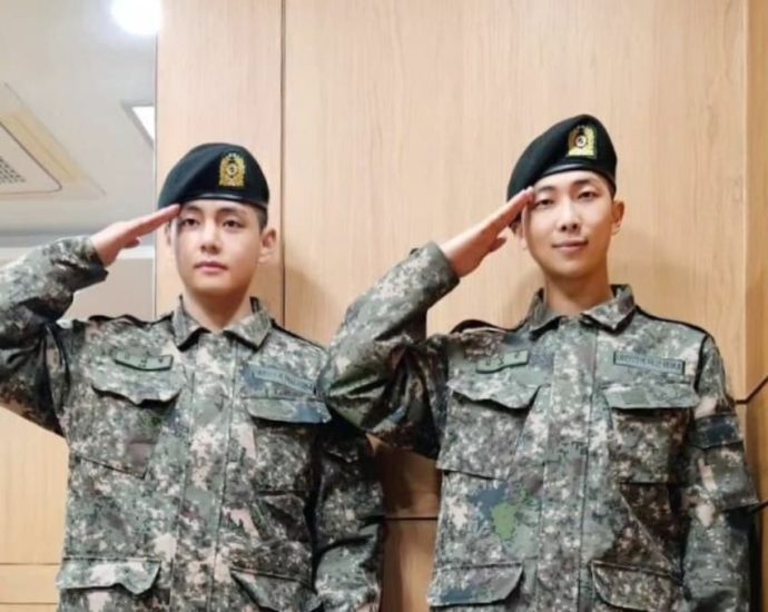 BTS members RM and V graduate from basic military training in South Korea as âelite traineesâ