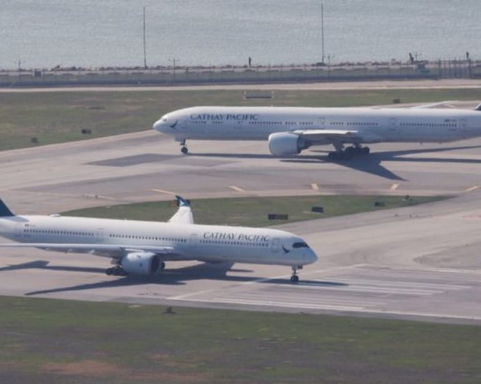 Cathay Pacific cuts a dozen flights a day until end of February to ease strain on operations