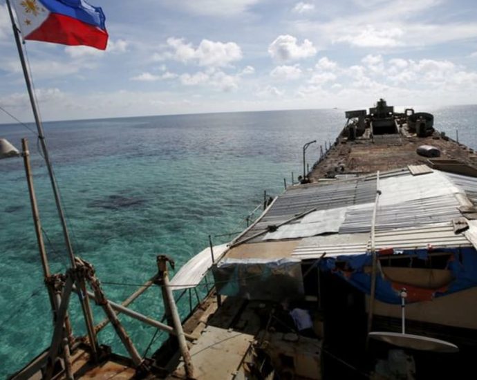 China allows Philippines to supply troops at disputed reef