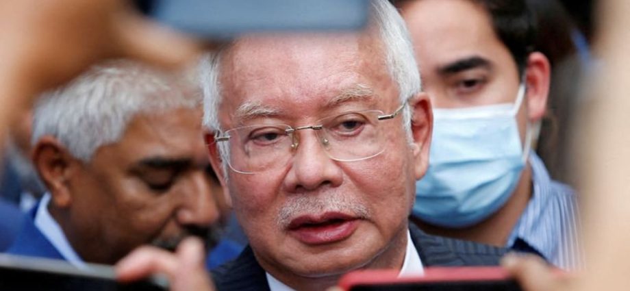 Former Malaysian premier Najib Razakâs jail term halved from 12 to 6 years, say official sources