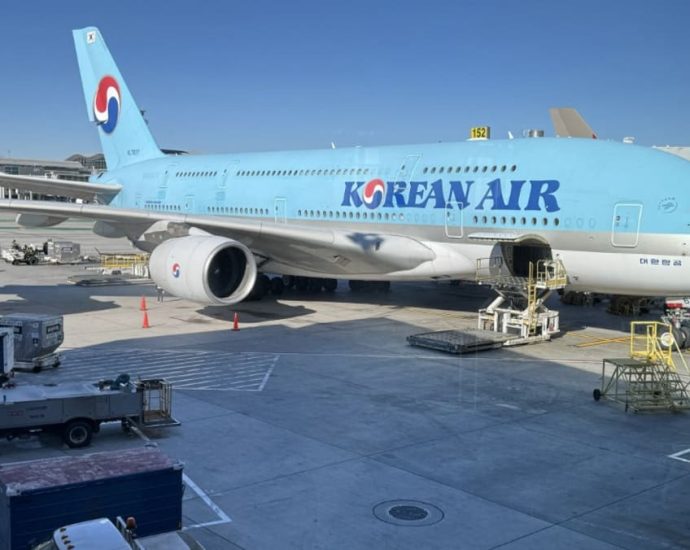 Korean Air plane scrapes Cathay Pacific Airways aircraft at Japan airport