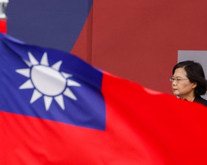 Taiwan president says ties with China must be decided by will of the people