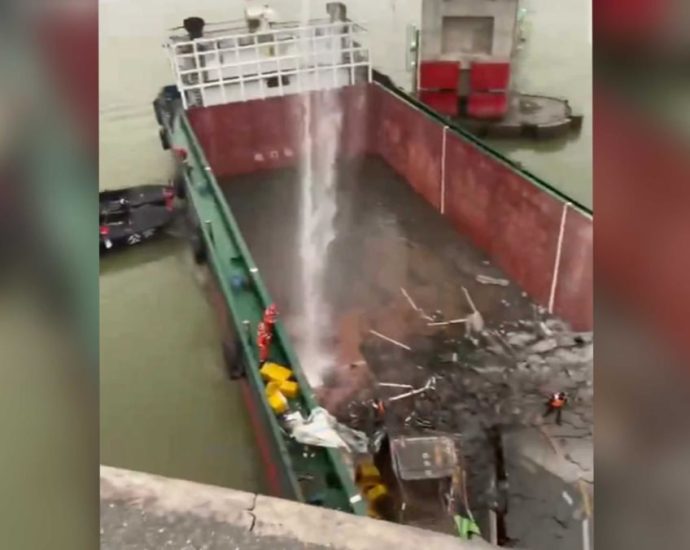 Bus driver missing, bridge fractured in Guangzhou cargo ship collision