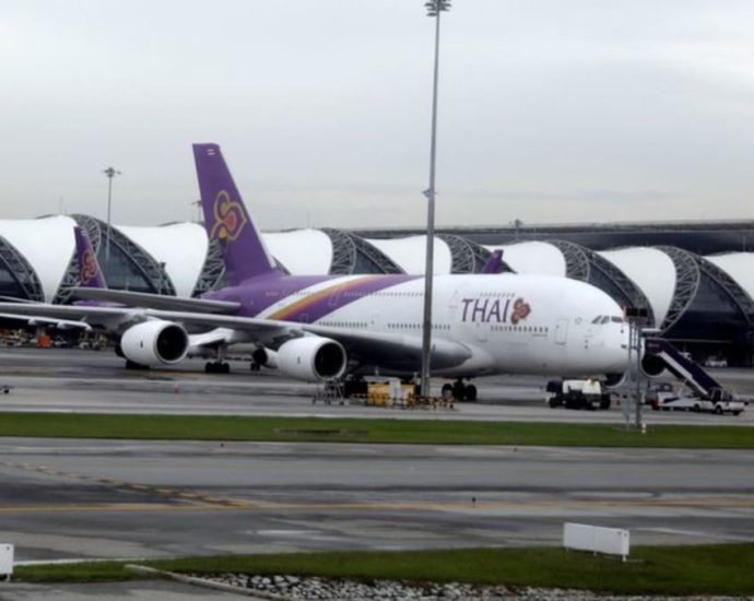 Canadian charged for trying to open Thai Airways plane door on runway