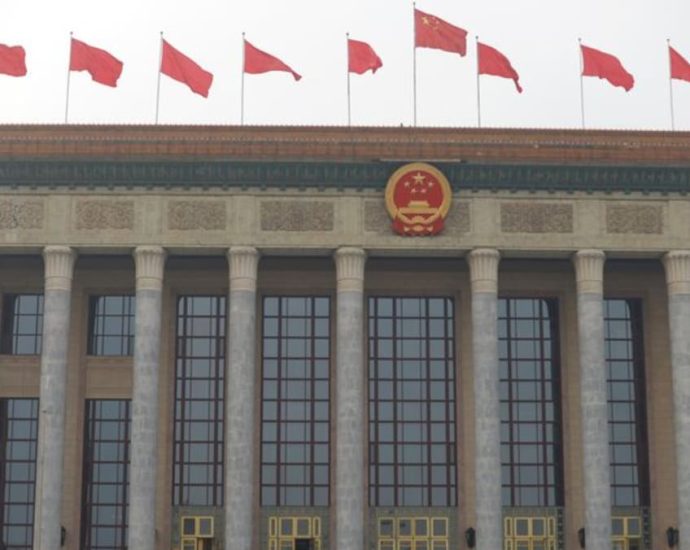 China broadens law on state secrets to include ‘work secrets’