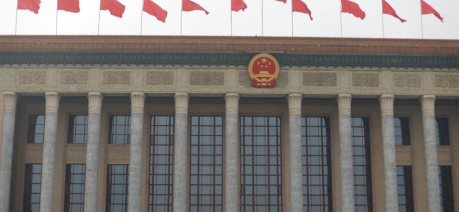 China broadens law on state secrets to include 'work secrets'