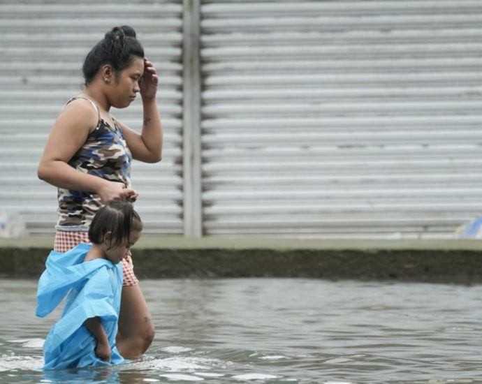 Death toll from Philippine landslides, floods rises to 14