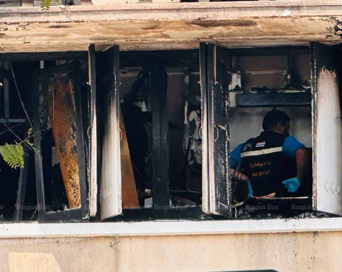 Forensic experts seek cause of ministry building fire