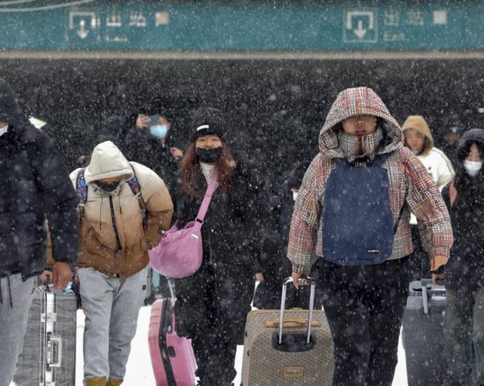 Icy weather in China disrupts travel rush ahead of Chinese New Year