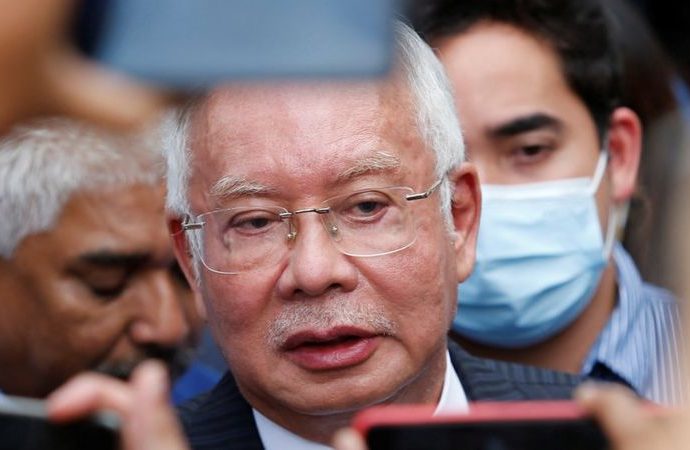 Malaysia halves ex-PM Najib Razak’s jail term over 1MDB scandal