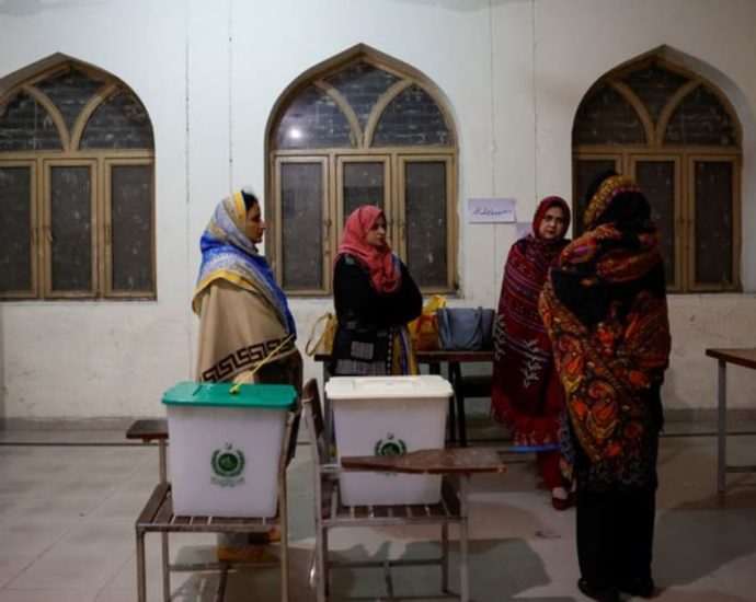 Pakistan begins voting with Khan in jail and Sharif tipped to win