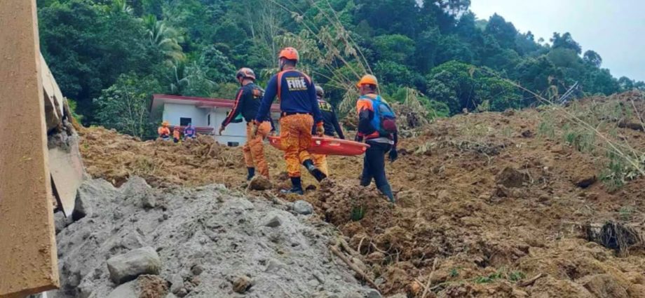 Rescuers use bare hands and shovels to search for landslide survivors in Philippines