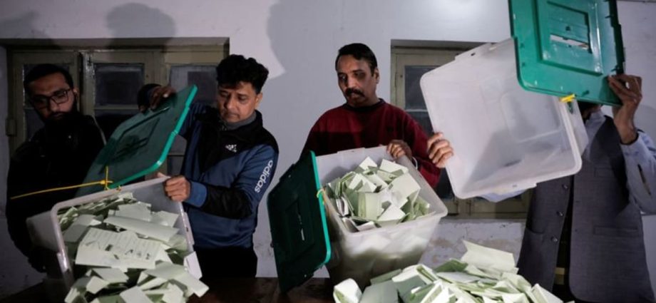 With over half the seats counted, Imran Khan's supporters lead in Pakistan polls