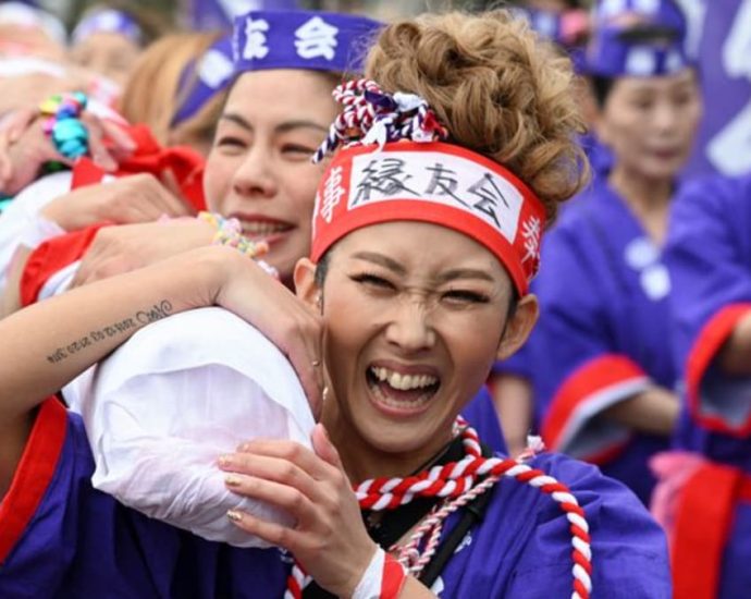 Women take part in Japan's 1,250-year-old 'naked festival' for first time