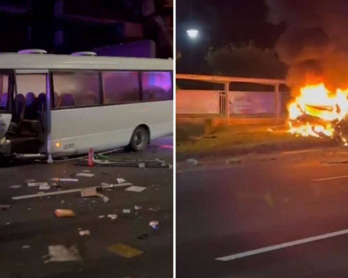 Accident along Bukit Timah Road involving school bus and burning car