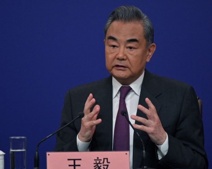 China’s Wang Yi blasts US ‘suppression’, defends Russia ties