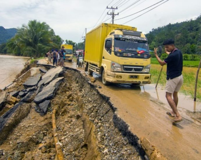 Death toll from Indonesia floods, landslides rises to 26