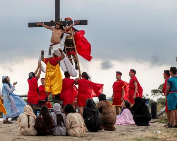 Philippines’ Catholic devotees nailed to crosses to re-enact crucifixion