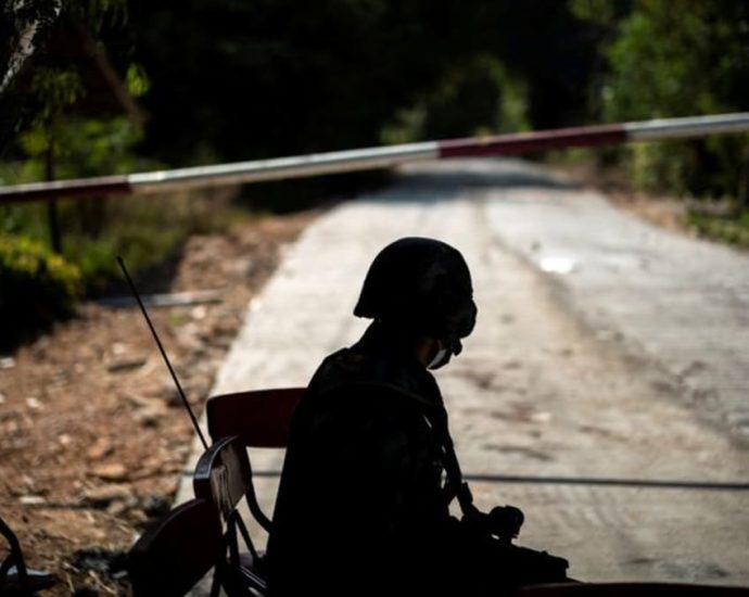 Myanmar troops retreat to Thai border bridge after days of fighting