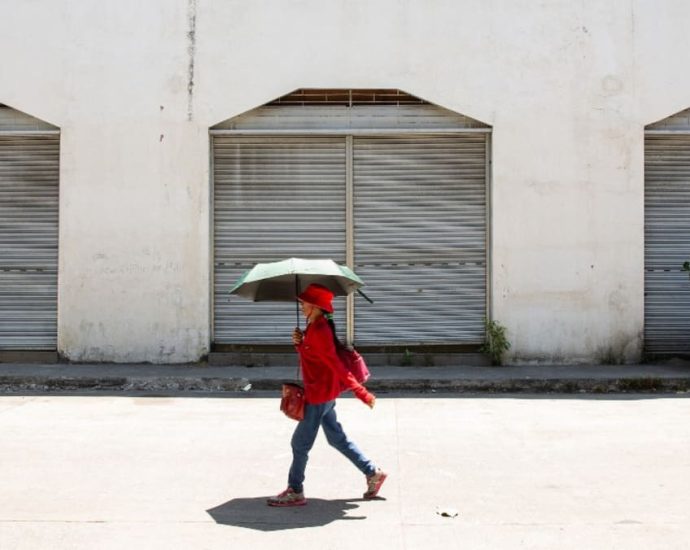 Schools closed, warnings issued as Asia swelters in extreme heatwave