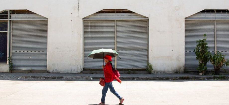 Schools closed, warnings issued as Asia swelters in extreme heatwave