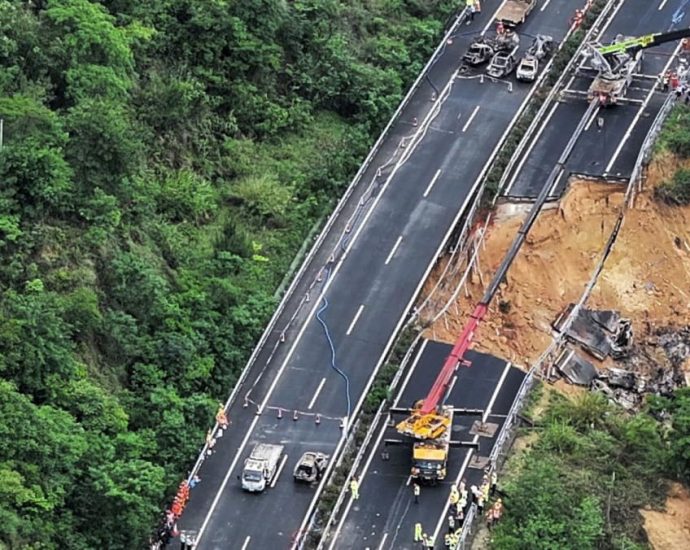 At least 24 people killed in south China road collapse