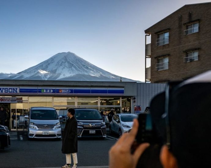 Commentary: Mount Fuji overtourism furore tests limits of Japan’s hospitality