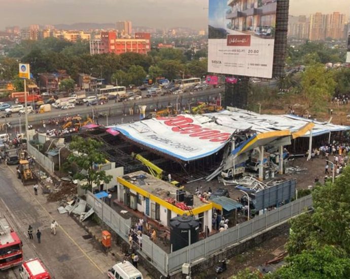 Four dead, several trapped under billboard in freak accident in Mumbai