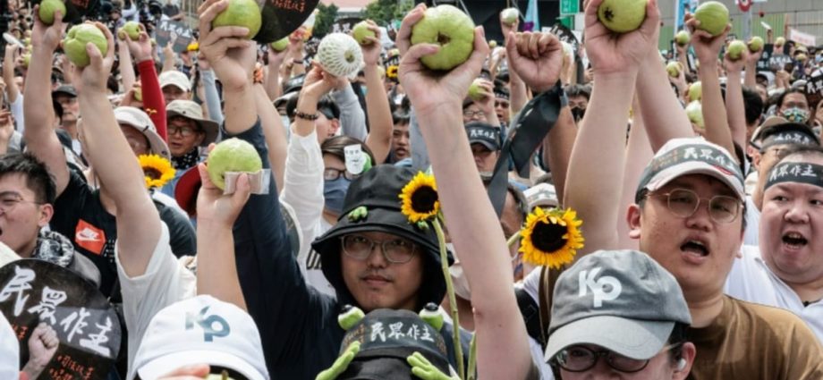 Hundreds protest Taiwan’s ruling party on eve of inauguration