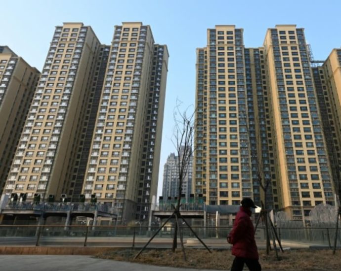 Shanghai lifts home-buying curbs to boost property sector