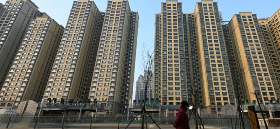 Shanghai lifts home-buying curbs to boost property sector