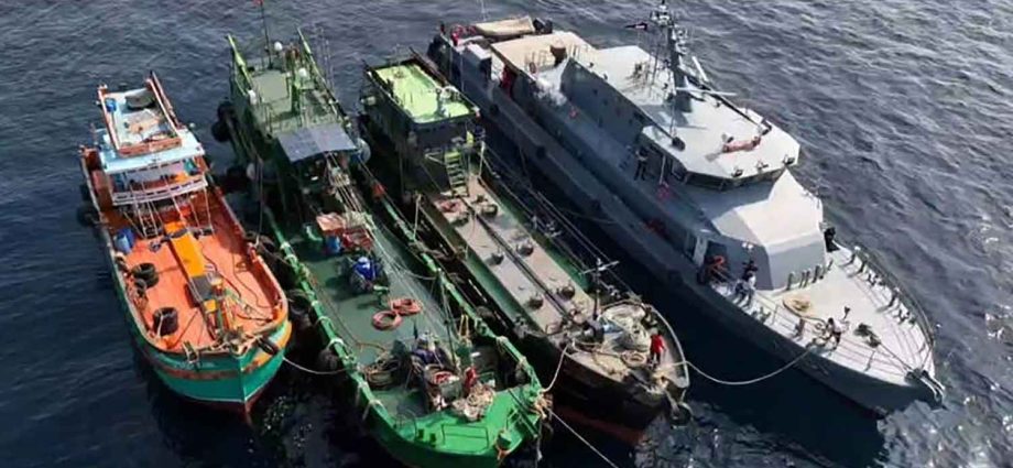 11 crew surrender in oil-smuggling case