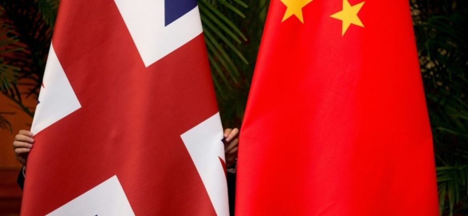 China says MI6 recruited state workers to spy for UK