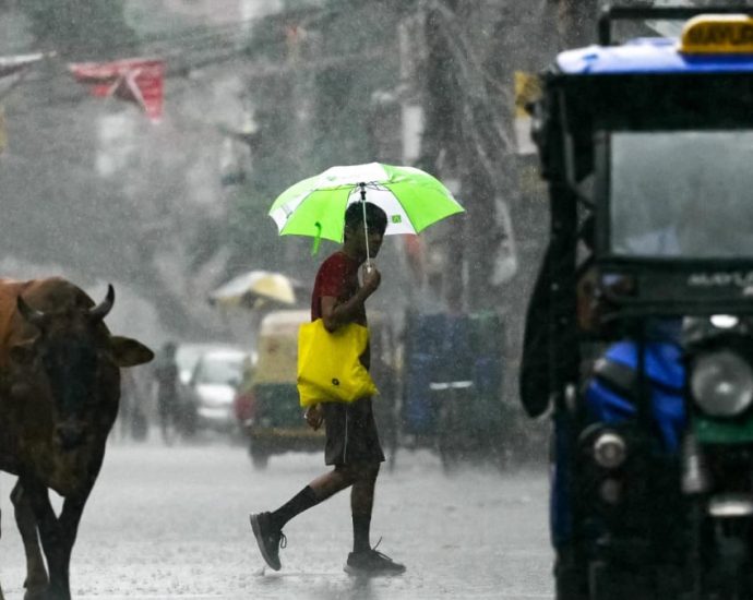 How India’s capital went from extreme heat to heavy floods