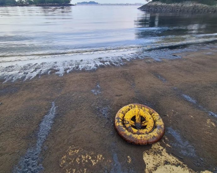 Sentosa’s Tanjong Beach covered by oil slick