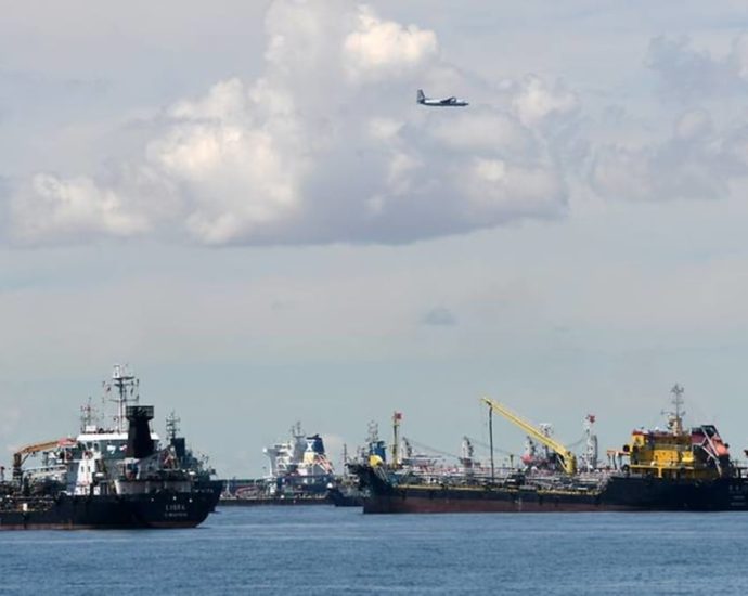 Two shipping firms charged with discharging 100L of oil each into Singapore waters, polluting sea