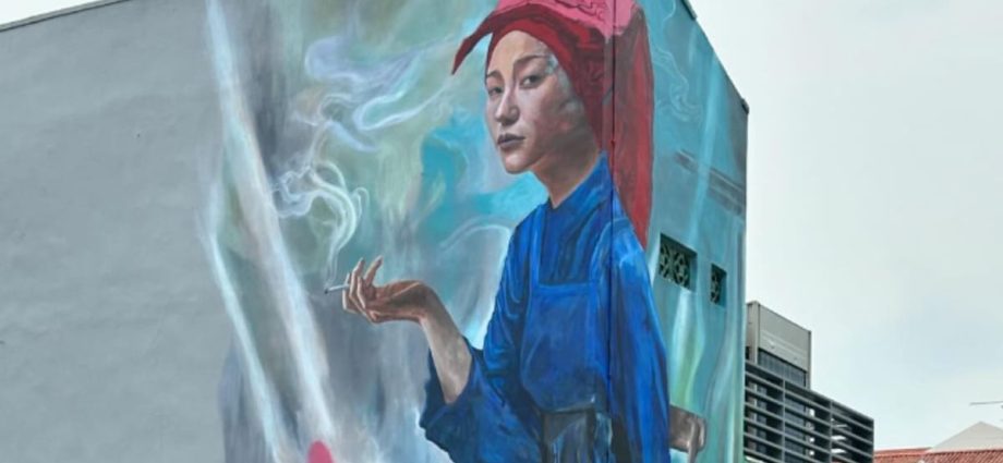 URA to re-evaluate stance over Chinatown mural featuring smoking samsui woman following public feedback