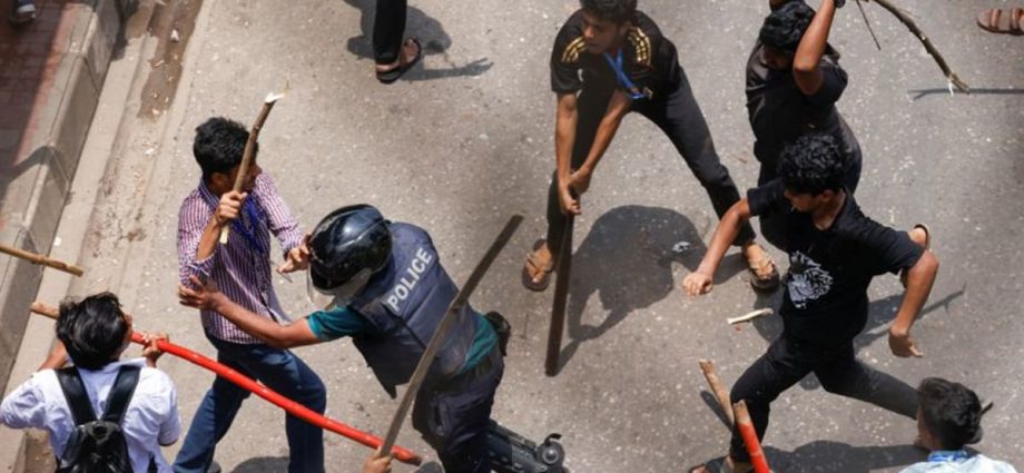 32 dead in Bangladesh unrest, protesters set fire to state TV network