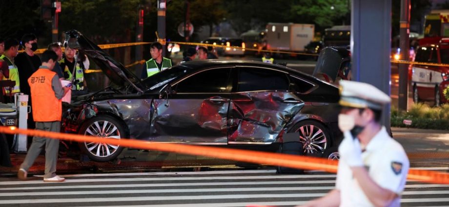 Car drives into crowd outside Seoul city hall, six dead