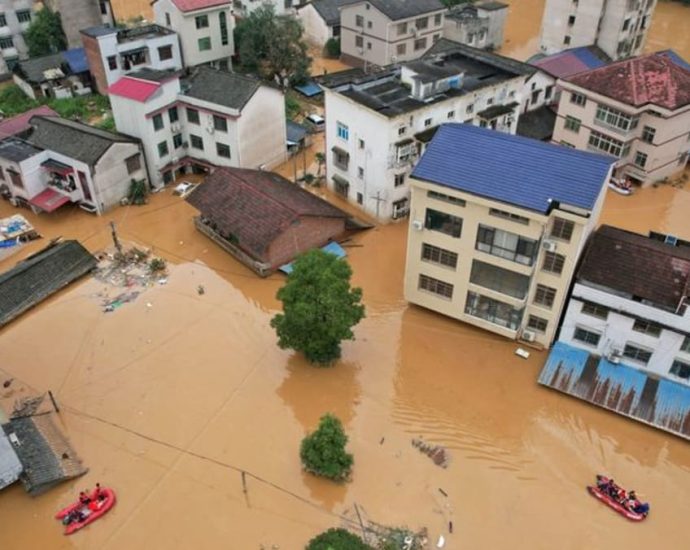 China braces for twin tropical cyclones after deadly flash floods