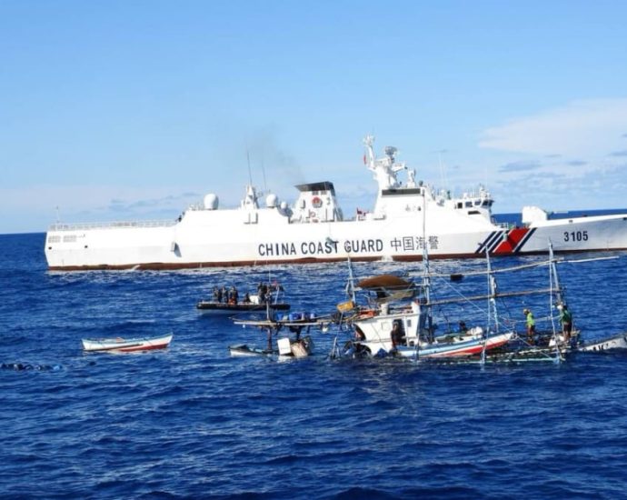 China helps rescue stranded Philippine fishermen in South China Sea after initially obstructing efforts, says Manila