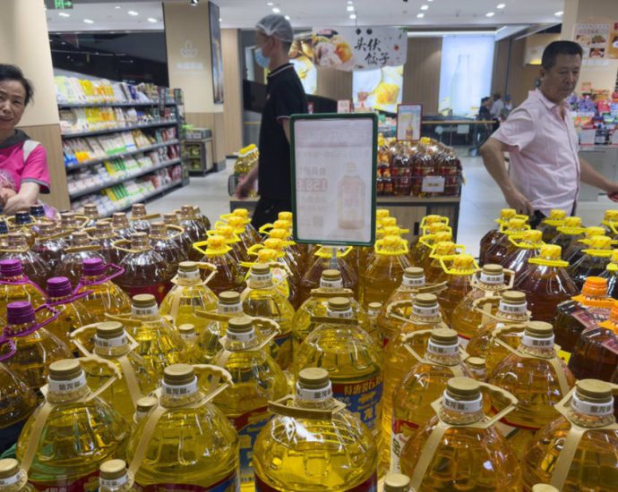 Cooking oil scandal may prompt China to tighten food safety policies, observers say