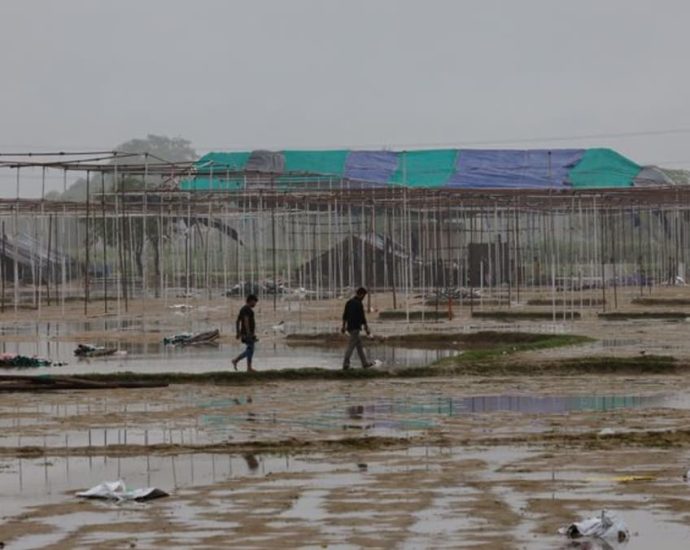 Six arrested in connection with stampede in north India, police say