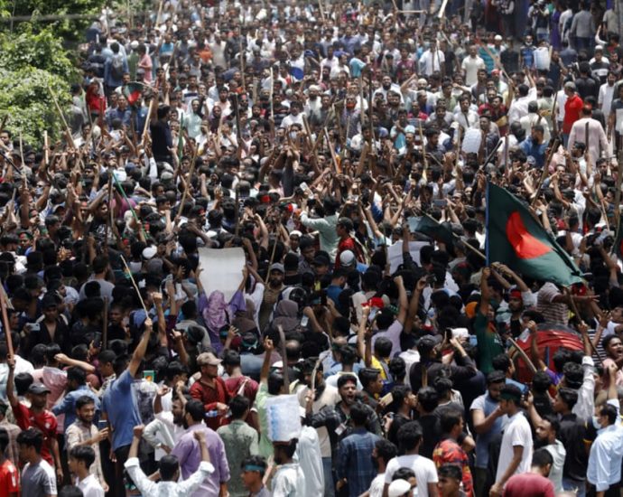 Bangladesh protesters call for march to Dhaka in defiance of curfew