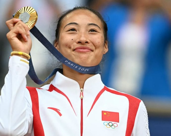 China’s Zheng Qinwen makes history with Olympic tennis singles gold