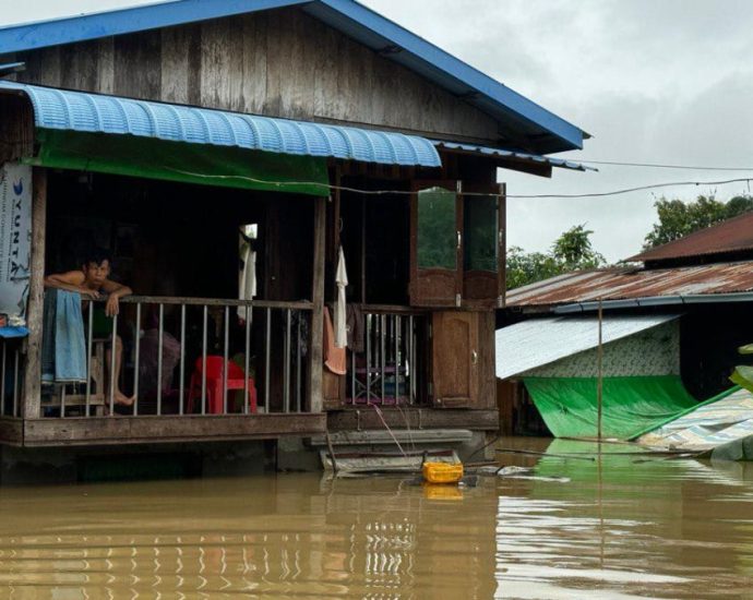 Double whammy for Myanmar residents facing floods, as help from military dwindles