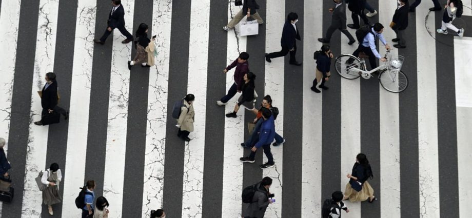 Japan scraps idea to woo women out of Tokyo with cash