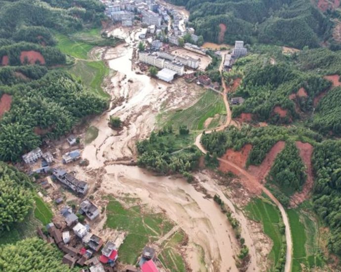 Rescuers in China race to find missing people, seal dykes after deadly floods caused by Typhoon Gaemi