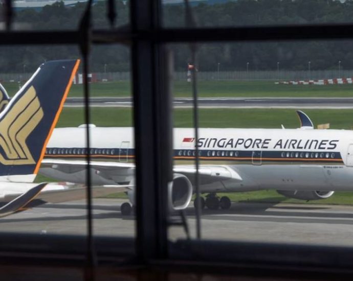 Smoke from Singapore Airlines jet engine forces temporary runway closure at Narita Airport